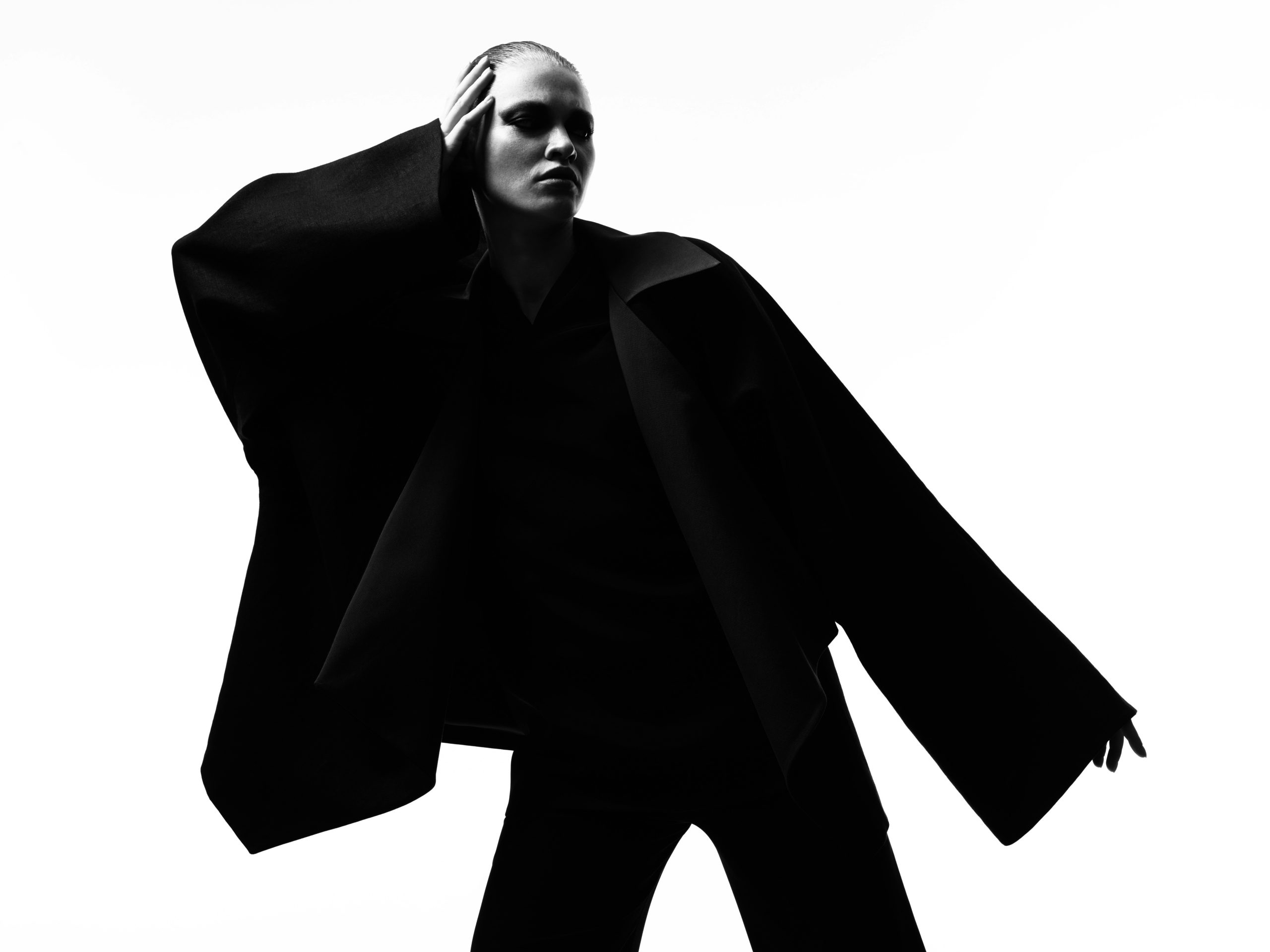 High-contrast fashion-model editorial portrait